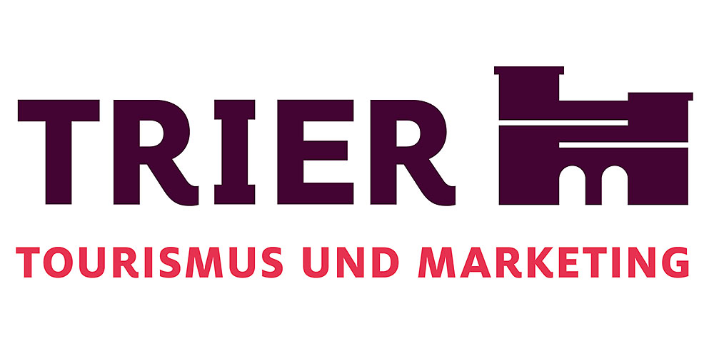 Das Logo der TTM besteht ebenfalls aus Porta und Schriftzug, nur seitenverkehrt.